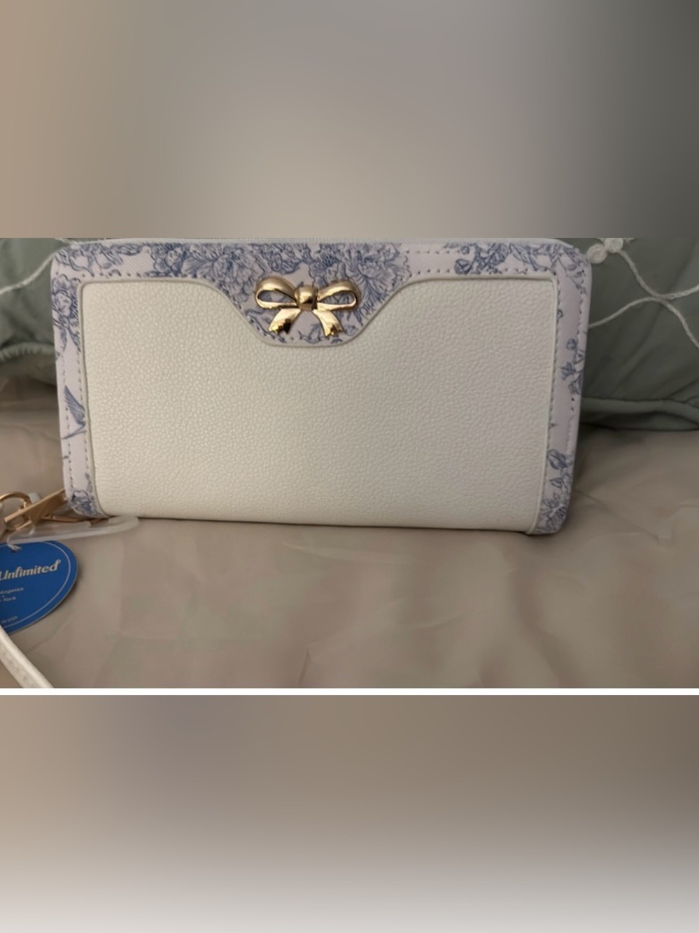 White Pebbled Clutch Wristlet with Gold Bow Accent